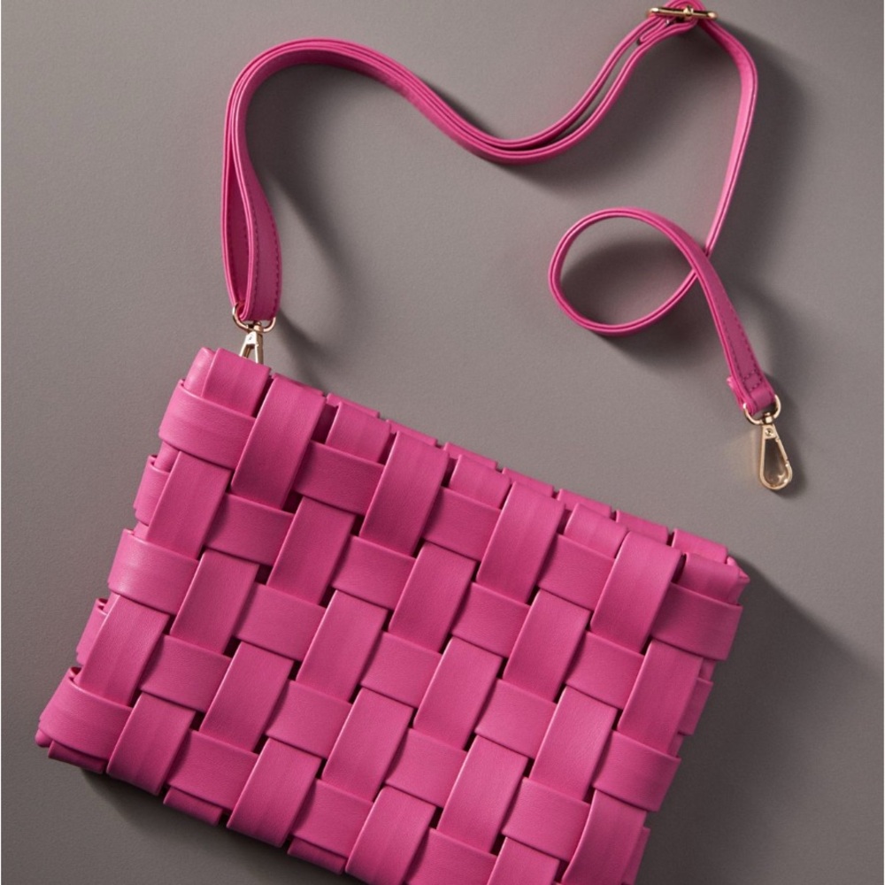 Anthropologie Fuchsia Woven clutch with strap